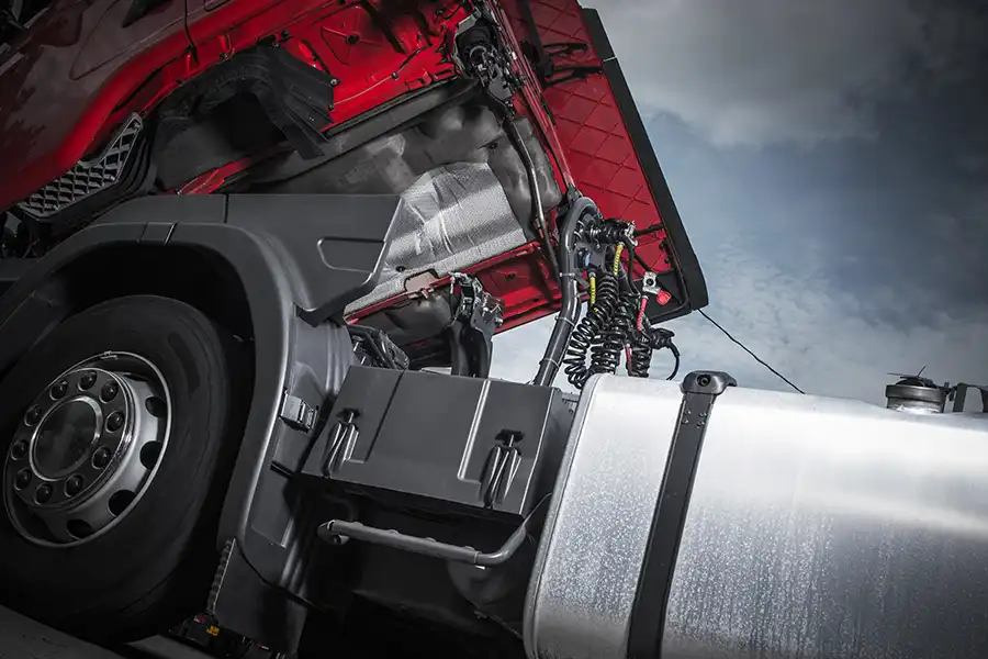 Decatur Trailer Sales & Service—a diesel engine semi-truck receiving oil change maintenance in Decatur, IL